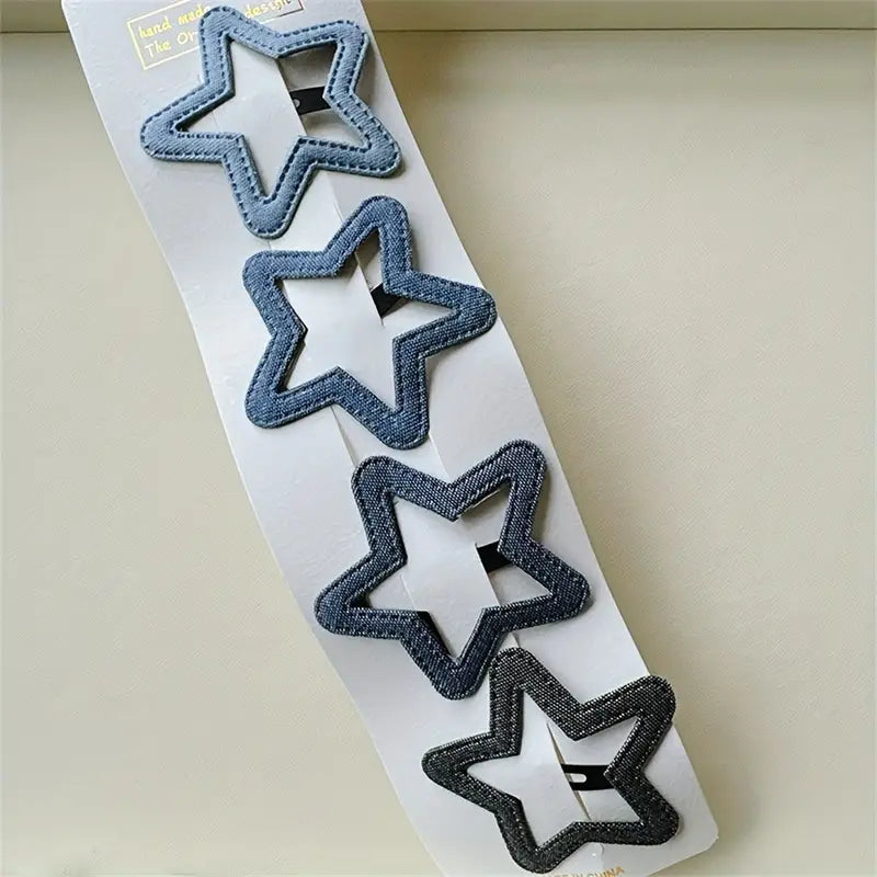 مجموعة من أربعة مشابك شعر بلون الأزرق الداكن